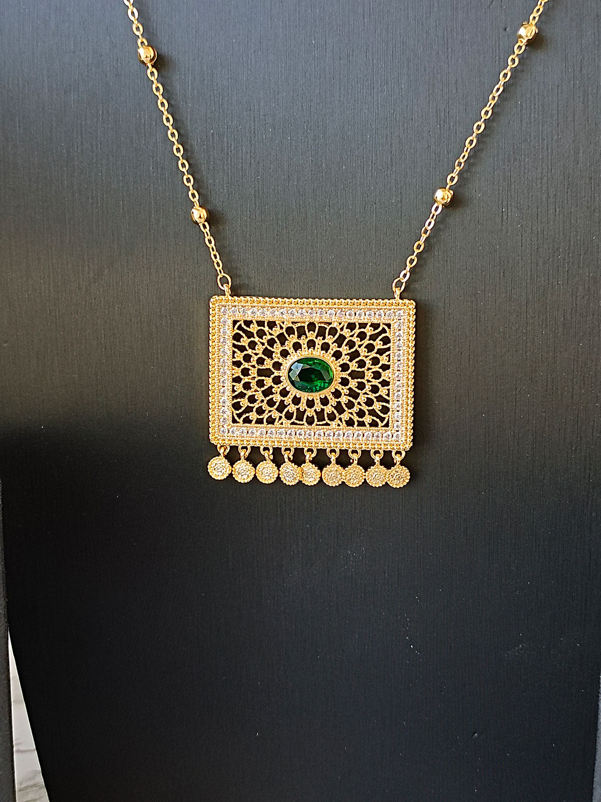 pendant with green accents