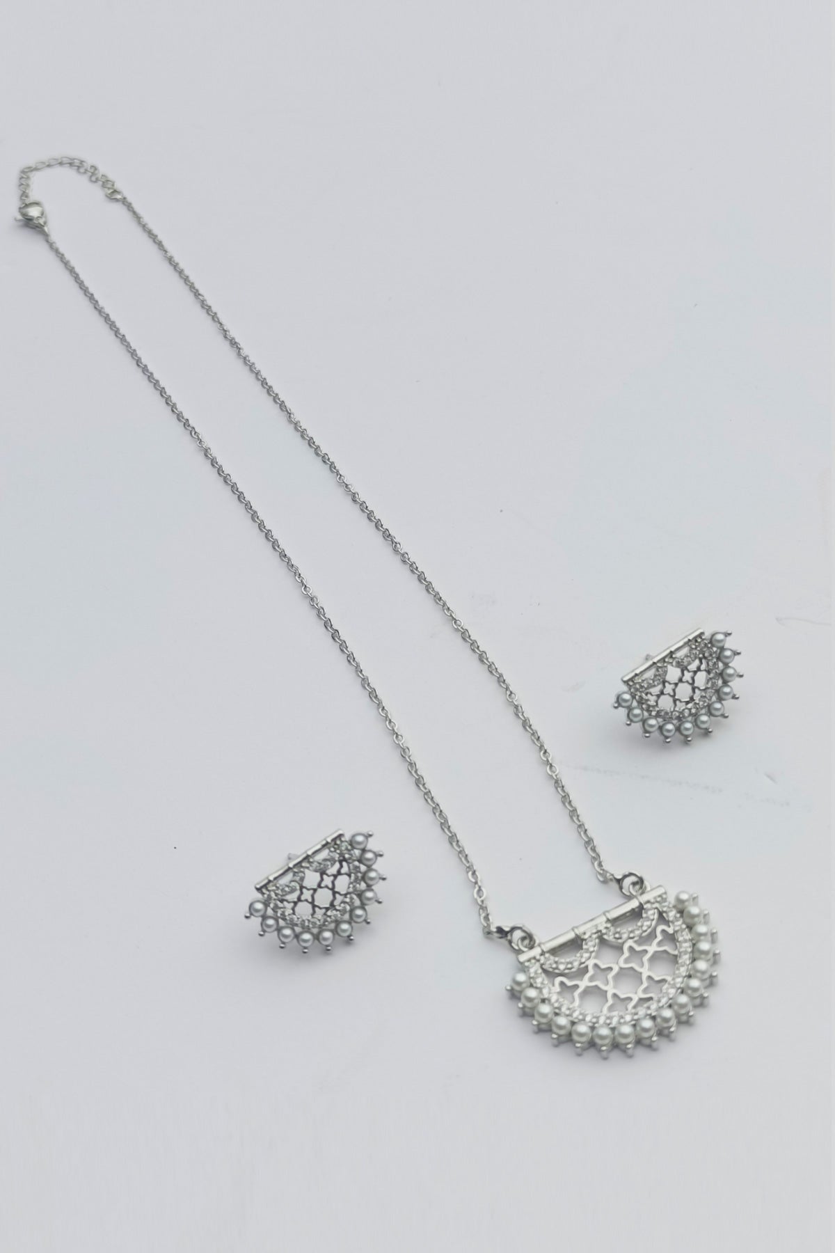 Silver amani pendant set