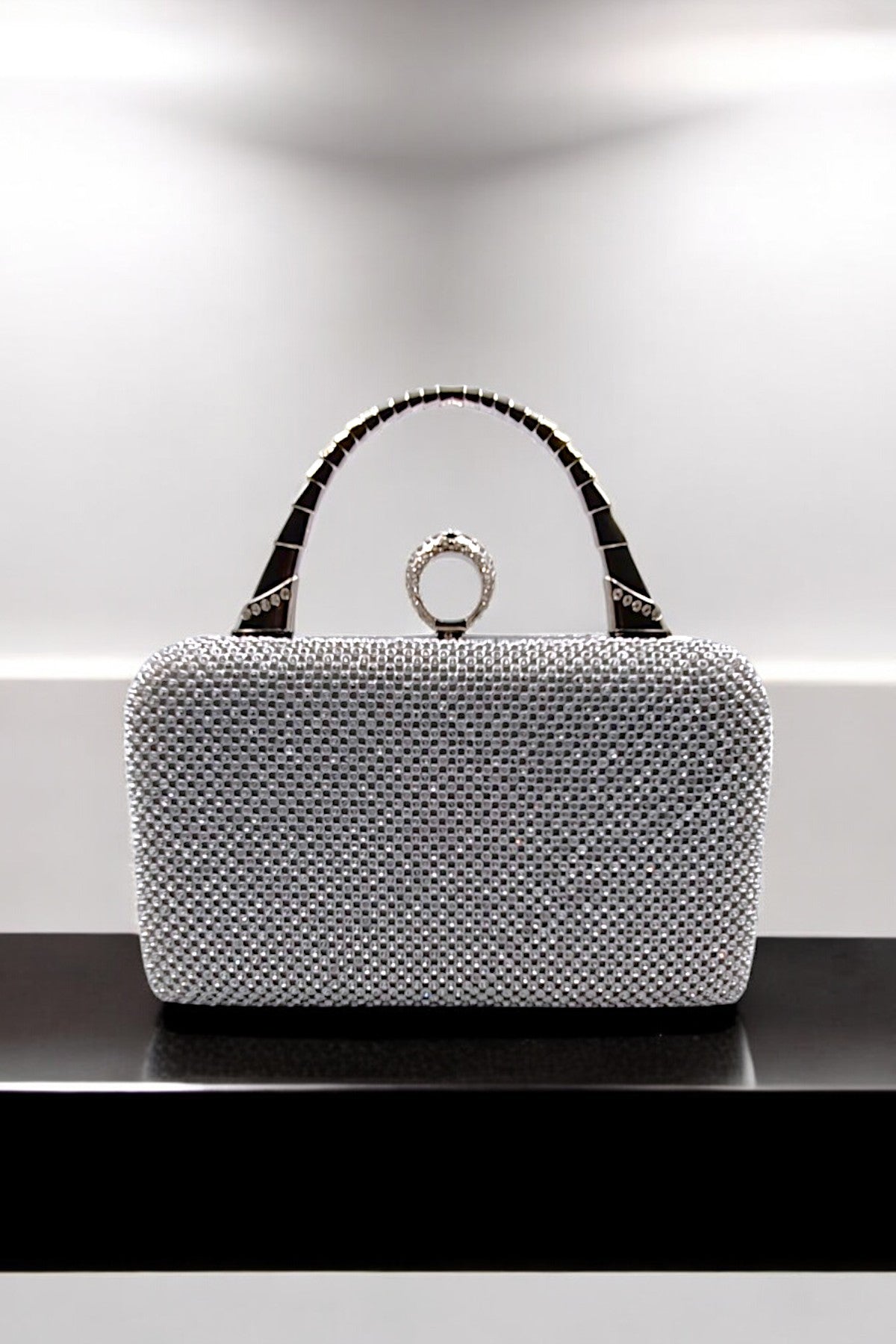 Stones studded clutch