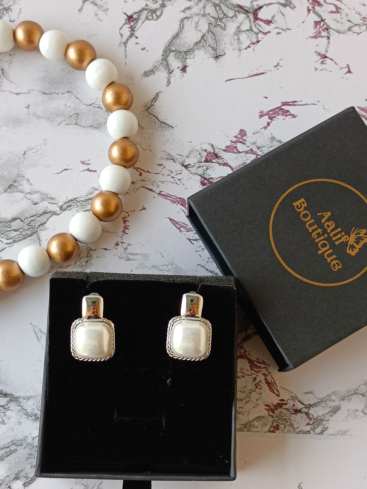 white trendy earrings