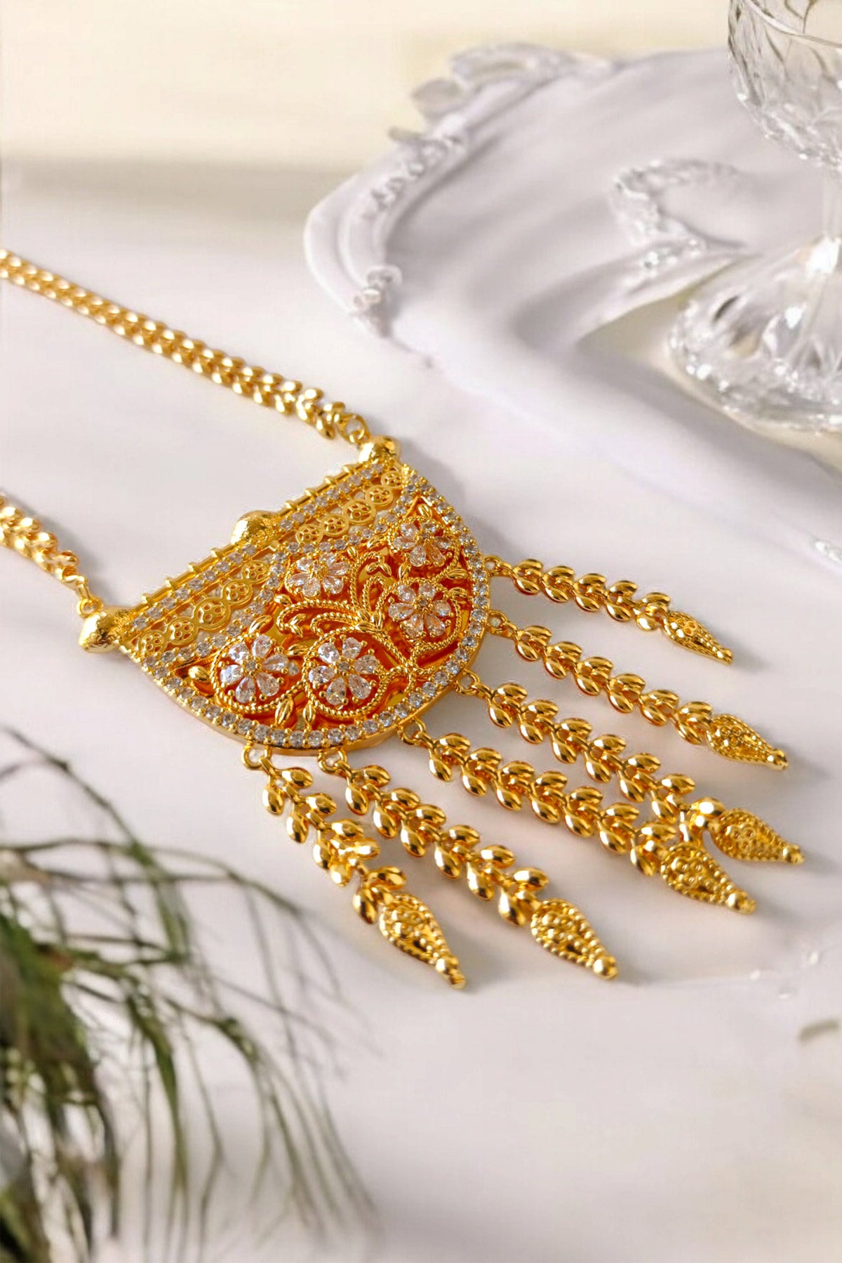 Faiha Hilal Necklace Set at floor