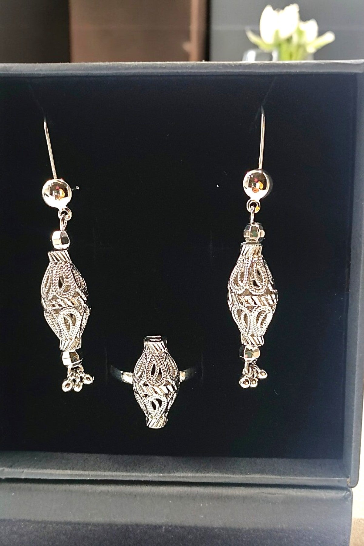 silver earrings and ring