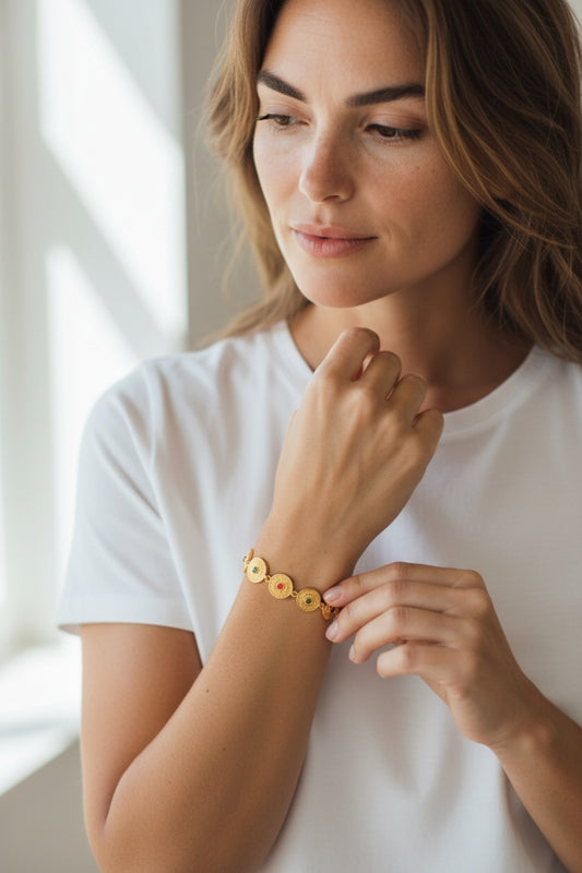 Gold Coin Charm Bracelet with Red & Green Stones
