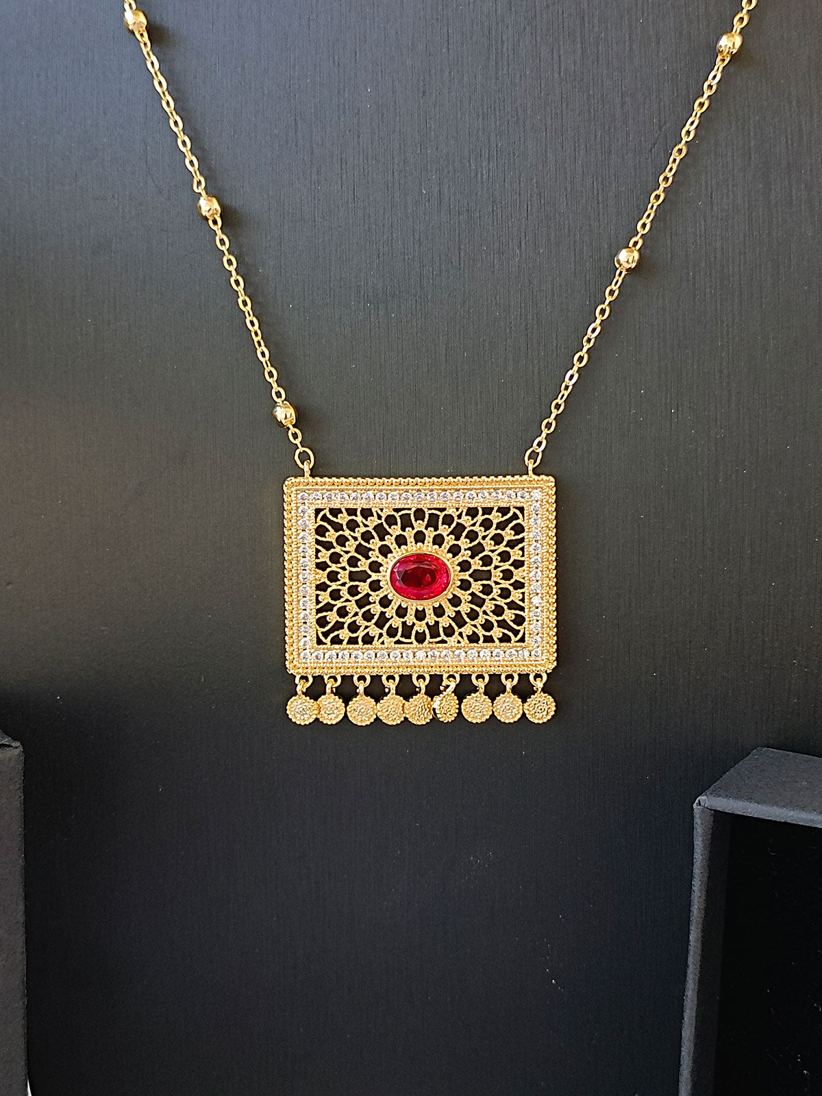 pendant with red accents